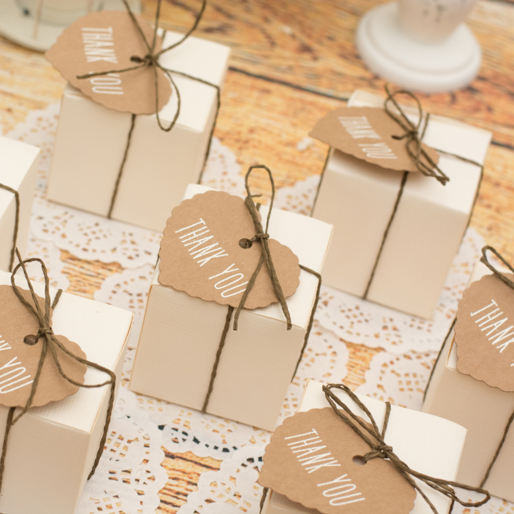 Personalized event giveaways displayed on a table.